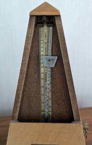 lot 68 image: Seth Thomas Metronome and Brass Piano Lamp