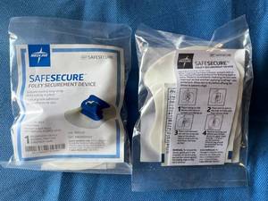 lot 68 image: MSRP $1800  6 Cases (50cs) Medline SafeSecure Foley Catheter Securement Device Expiration 422 These Make A Great Tool For Fastening Plugs & Cords Securely Out Of The Way At Home & Office 