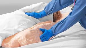 lot 61 image: MSRP $500  1 NEW Molnlycke Z-Flo Fluidized Full Body Positioner 16 x 30 Patient positioning and repositioning is recommended as part of a successful pressure ulcer prevention protocol 1 Expiration 924 - I want this