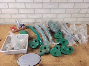 lot 804 image: Backyard Playset Parts -(3) Handles, (10) Rock Climbing Holds, Bolts, Screws and More