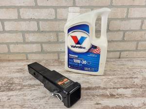 lot 871 image: Trailer Hitch Extension and 5-Quart Jug of Valvoline 10W-30 - NO SHIPPING