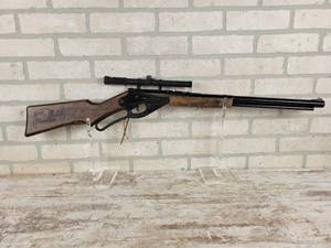 lot 695 image: DASIY Red Ryder 2000 Millennium Edition Air Rifle with DAISY 4X15 Scope - Wood Stock & Forearm - Tested and Works