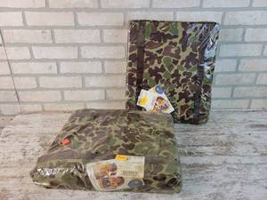 lot 973 image: (2) NEW Camo Boar Float Cushions