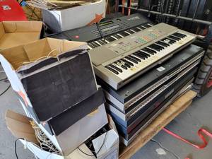 lot 701 image: (18) YAMAHA and ROLAND Keyboards, Headphones, Power Supplies and More - NO SHIPPING