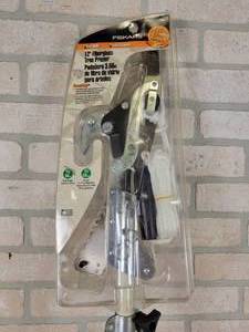 lot 1051 image: NEW Fiskars 12 Tree Pruner - NO SHIPPING