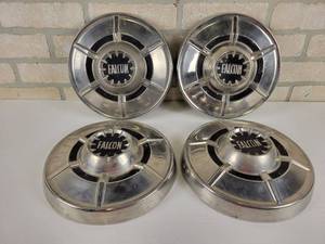 lot 177 image: (4) FORD Falcon Hubcaps
