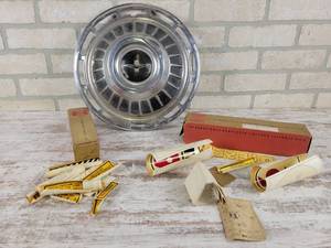 lot 179 image: Chevrolet Corvair Monza 900 Hubcap and Assorted Vintage IH Decals