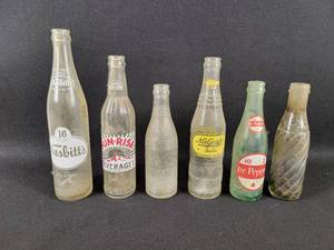 lot 187 image: (6) Vintage Bottles - 16oz Nesbitts - Sun-Rise Beverages - Austin bottling Works, Austin, MN - NuGrape Soda, Dr Pepper - Soda Stream Made in the UK