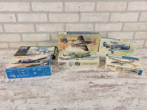 lot 286 image: (6) Vintage Military Airplane Models - Hellcat, Kittyhawk, Lockheed Hudson 1, Widgeon and SB2C Helldiver