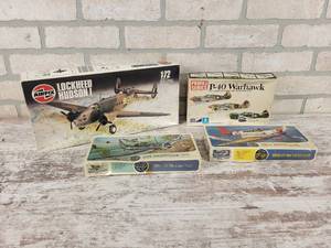 lot 287 image: (4) Vintage Military Airplane Models - Lockheed Hudson 1, Douglas SBD Dauntless, P-40 Warhawk, Douglas TBD-1 Devastator