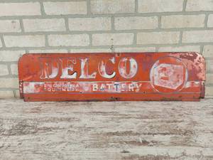 lot 39 image: Vintage DELCO Battery Steel Double Sided Sign - Approx. 35 x 9