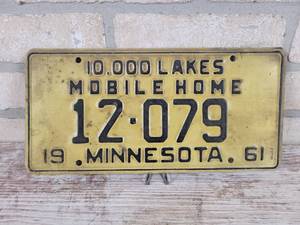 lot 310 image: 1961 Minnesota Mobile Home License Plate