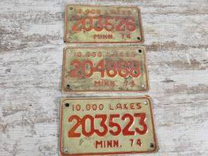 lot 334 image: (3) 1974 Minnesota Motorcycle License Plates