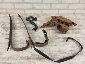 lot 356 image: Antique Climbing Gaffs, Pulleys and Ornate Cast Iron Bracket