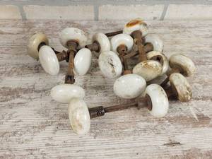 lot 366 image: Antique White Doorknobs