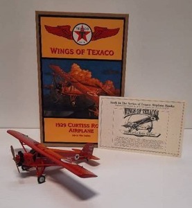 lot 55 image: Wings of Texaco 1929 Curtiss Robin Airplane Die-Cast Metal Coin Bank (1998 Ertl Stock Number H122)