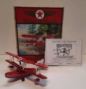 lot 57 image: Wings of Texaco The Duck 1936 Keystone-Loening Commuter Die-Cast Metal Coin Bank (2000 Ertl Stock Number 19538v)