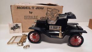 lot 61 image: Black Ford Model T Jim Beam Whiskey Decanter - Empty - Date on Bottom says 1974