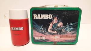 lot 65 image: Vintage 1985 Rambo Steel Lunch Box & Thermos