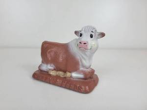 lot 90 image: Dotson Iron Casting Cow Paperweight - Fuzzys Feeds