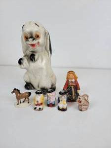 lot 119 image: Chalkware Dog with Miniature Ceramic Figurines