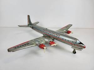 lot 143 image: Vintage Cragstan DC-7 American Airlines Battery Operated Tin Litho Airplane