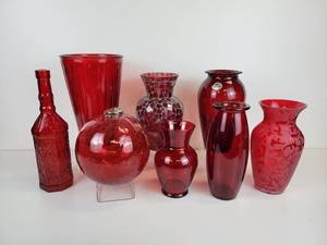 lot 215 image: Red Glassware Collection - (6) Vases, Bottle, and Gazing Ball - NO SHIPPING