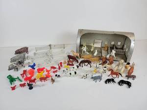 lot 219 image: Vintage Friendly Acres Dairy Farm Barn Tin Playset with Fencing and PlasticRubber Animals