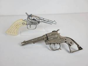lot 222 image: Pair of Vintage Toy Cap Guns - Davy Crockett and Indian Head