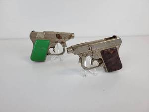 lot 224 image: Pair of Vintage CAPTAIN Cap Guns