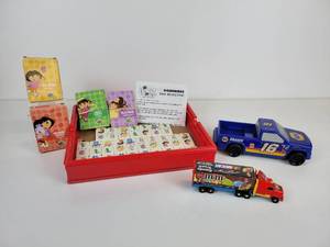 lot 226 image: Lot of Kids Toys - Dora the Explorer Dominoes and Card Games, Napa Pickup Race Truck, and M&Ms Candy Dispenser Truck