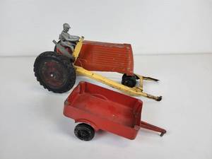 lot 229 image: Vintage Silk Toys Aluminum Red Tractor with Loader and Pull-Behind Wagon - MFG in Lansing, Iowa