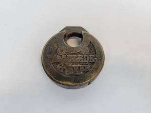 lot 12 image: Vintage Laglede 6-Lever Push Key Pancake Padlock