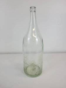 lot 31 image: Large Vintage Embossed Roxo Beverage Bottle