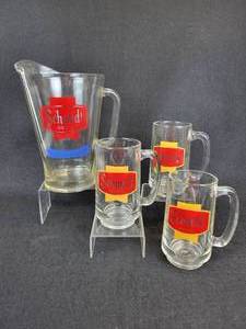 lot 437 image: Schmidt Beer Pitcher and (3) Schmidt Beer Glasses