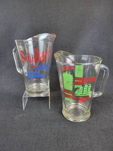 lot 439 image: Pair of Glass Beer Pitchers - Heilmans Special Export Beer and Schmidts Beer
