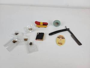lot 500 image: Lot of Vintage Trinkets - DeKalb Pins, FFA Pin, Oscar Meyer Weinermobile, Childrens Prayer Book, and More