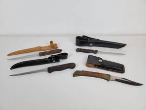 lot 501 image: Lot of (4) Knives - (3) Filet Knives and (1) Folding Pocket Knife