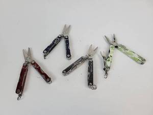 lot 512 image: Lot of (4) Miniature Multitools - Leatherman and More