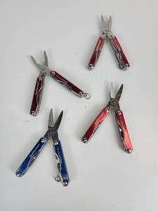 lot 514 image: Lot of (4) Miniature Multitools - Leatherman Squirt