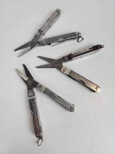 lot 520 image: Lot of (3) Leatherman Micra Multitools