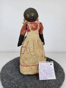 lot 527 image: Handmade Antique Doll on Sand-Filled Milk Bottle - NO SHIPPING