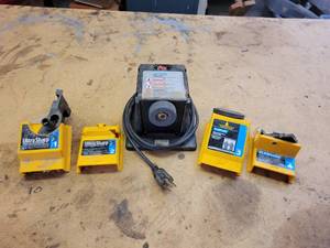 lot 28 image: PLASPLUGS Drill Bit Sharpener w Assorted Guides - Drill Bits, Masonry Bits, Knife & Scissor, Chisel & Plane