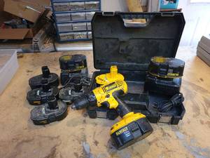 lot 49 image: DeWalt 18V Driver, (8) Batteries and (2) Chargers  Case