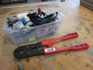 lot 50 image: SIOUX CHIEF 12 & 33 PEX Crimping Tool and Assorted Fittings