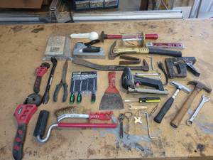lot 74 image: Hammers, Staple Guns, Strap Wrenches, Picks, Level and More