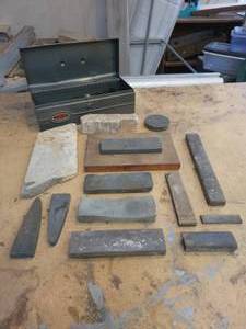 lot 81 image: Lot of Assorted Sharpening Stones in Metal Toolbox