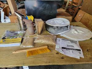 lot 137 image: Lot of Assorted Bee Keeping Supplies - Smokers, Fuel, Hats, and More NO SHIPPING