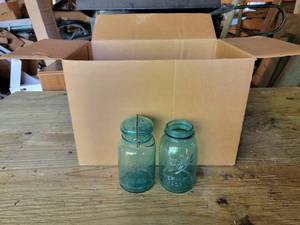 lot 163 image: Lot of (9) BLUE Glass Lid and Wire Bail Quart Ball Jars and (4) Ball Perfect Mason Quart Jars with no lids - NO SHIPPING