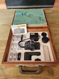 lot 180 image: Pentax Auto110 System - Includes Camera Body, Flash, Filters, Film Winder, and More